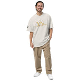 Oversized Signature Tee in premium cotton with relaxed fit and ribbed crew neckline for casual streetwear style