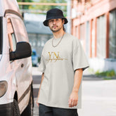 Oversized Signature Tee in premium cotton with relaxed fit and ribbed crew neckline for casual streetwear style