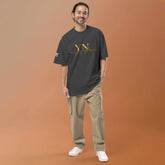 Oversized Signature Tee in premium cotton with relaxed fit and ribbed crew neckline for casual streetwear style