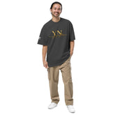 Model wearing a comfortable oversized signature tee in a relaxed fit with a ribbed crew neckline, styled for casual streetwear.