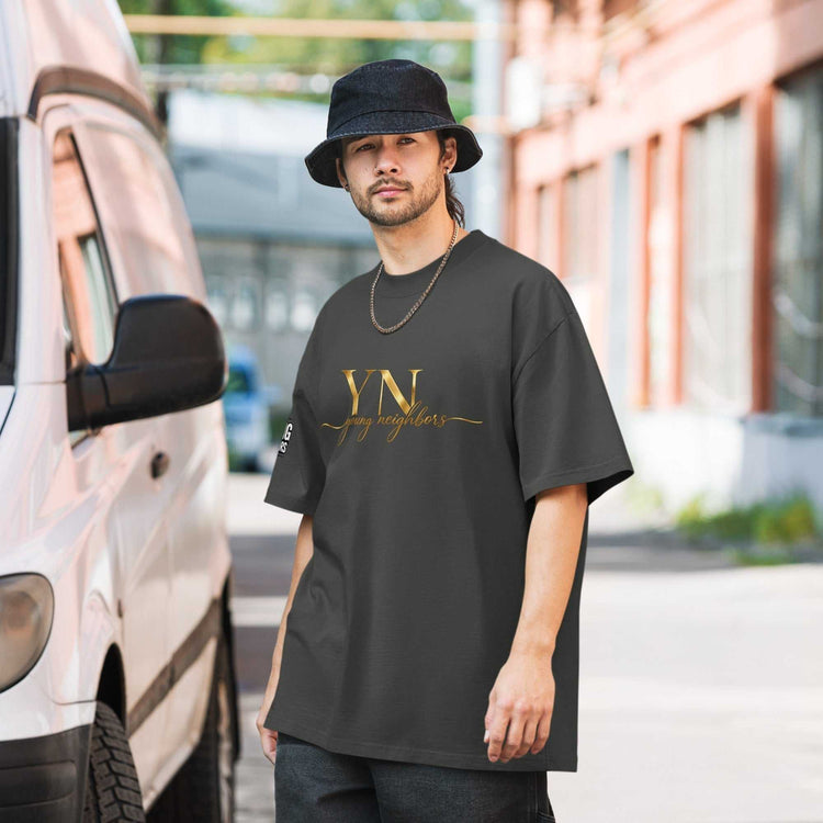 Unisex oversized signature tee made of premium cotton with relaxed fit and ribbed crew neckline for casual streetwear style