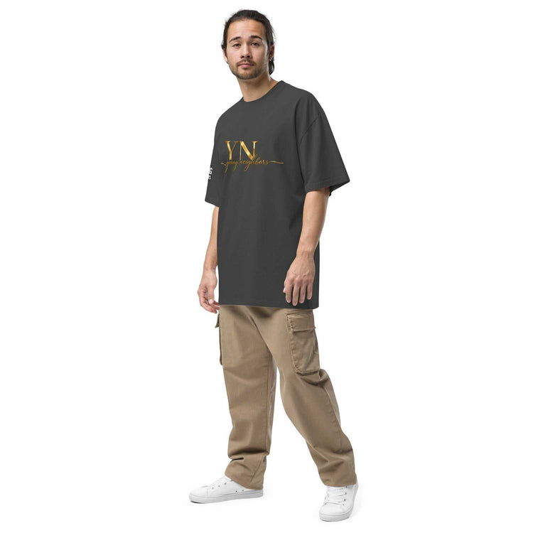 Woman wearing oversized signature tee in casual streetwear style