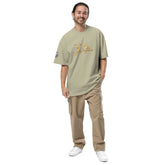Man wearing oversized signature tee in casual streetwear style outdoors