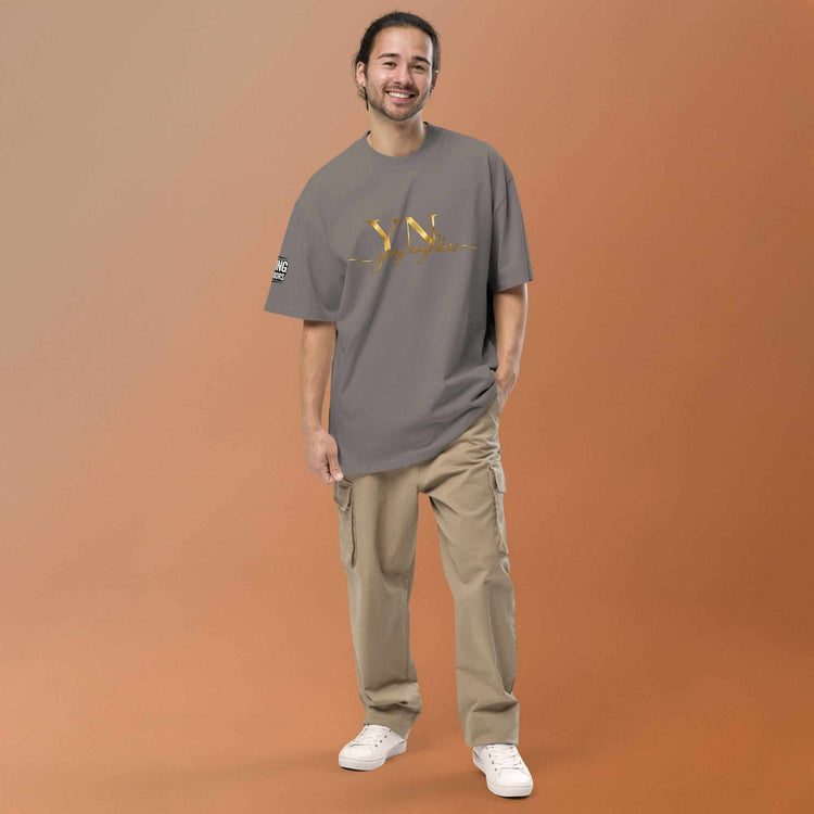Oversized Signature Tee in premium cotton with relaxed fit and ribbed crew neckline for all-day comfort and style