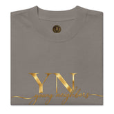 Man wearing oversized signature tee in casual streetwear style, relaxed fit premium cotton T-shirt