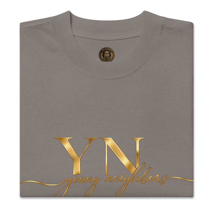 Man wearing oversized signature tee in casual streetwear style, relaxed fit premium cotton T-shirt