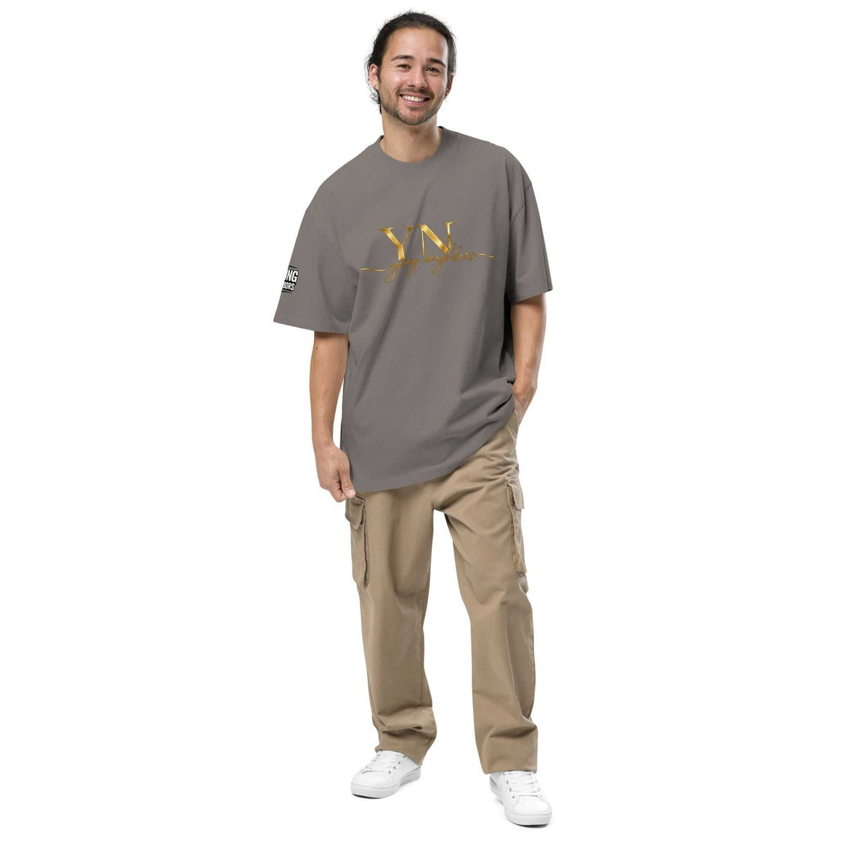 Oversized Signature Tee in premium cotton with relaxed fit and ribbed crew neckline, styled for casual streetwear.