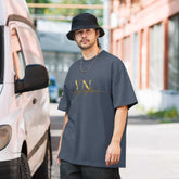 White oversized signature tee on a mannequin showcasing relaxed fit and premium cotton fabric style