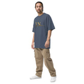 Man wearing oversized signature tee in casual streetwear style