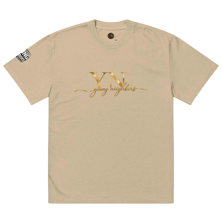 Oversized Signature Tee in premium cotton with relaxed fit and ribbed crew neckline