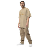 Unisex oversized signature tee in soft breathable cotton with relaxed fit and ribbed crew neckline