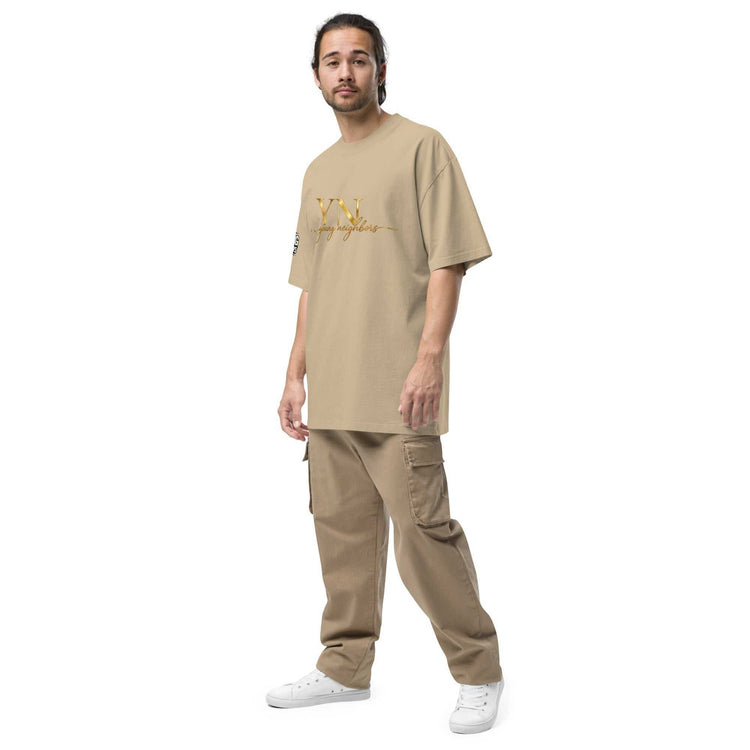Unisex oversized signature tee in soft breathable cotton with relaxed fit and ribbed crew neckline