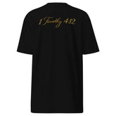 Premium Young Neighbors tee with metallic gold logo and 1 Timothy 4:12 scripture on back