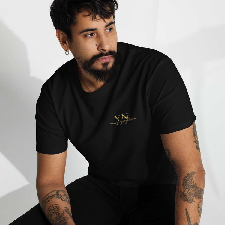 Young Neighbors premium tee with metallic gold embroidered logo and 1 Timothy 4:12 scripture detail