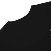 Young Neighbors premium tee with metallic gold logo and 1 Timothy 4:12 scripture design