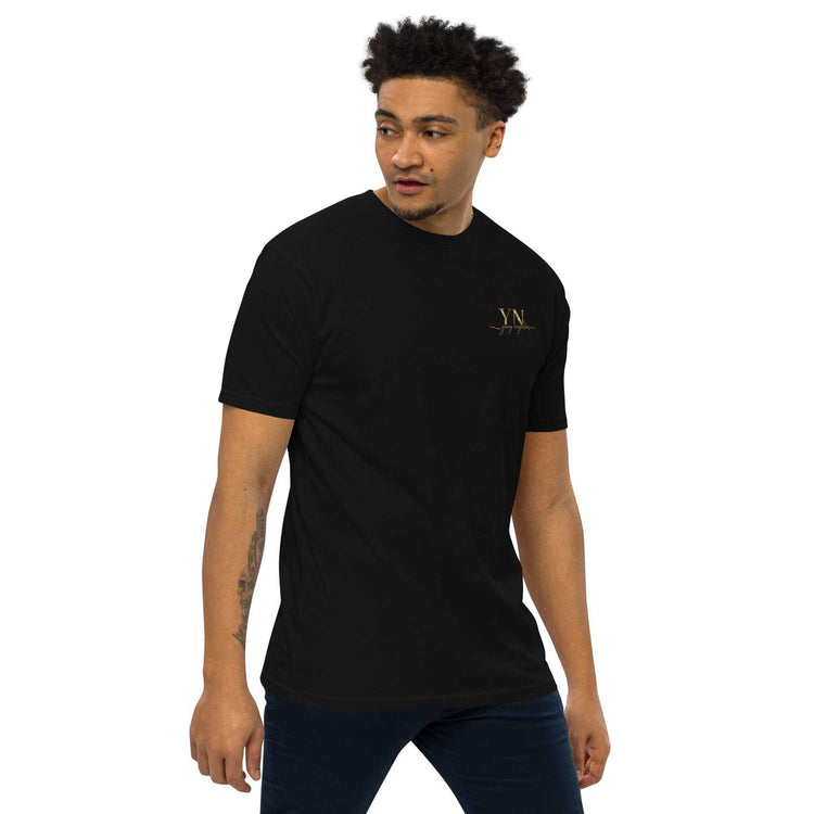 Black premium Young Neighbors tee with metallic gold embroidered logo and 1 Timothy 4:12 scripture on back