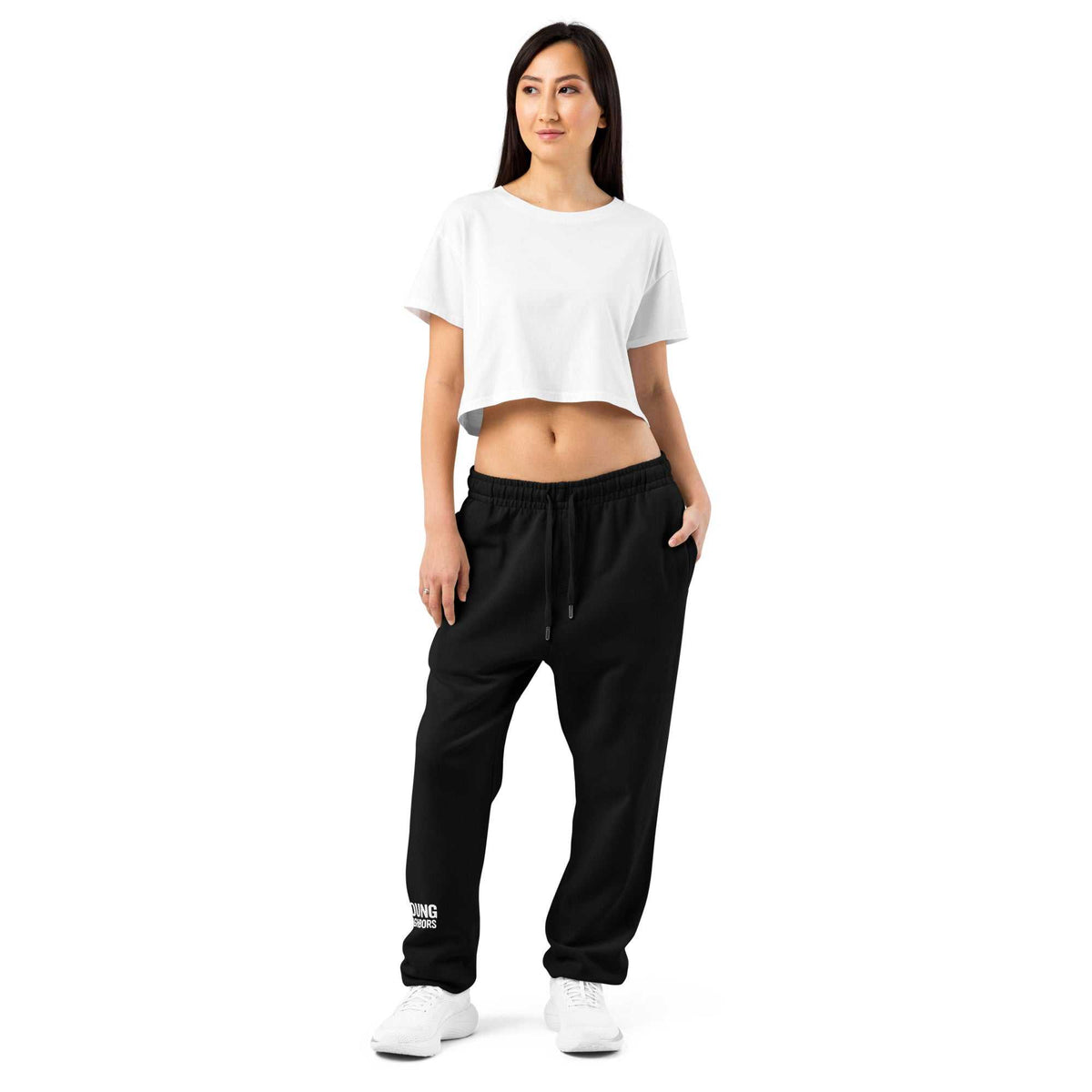 Black Young Neighbors™ Signature Sweatpants with embroidered crest, elastic waistband, and ribbed cuffs for comfortable stylish wear